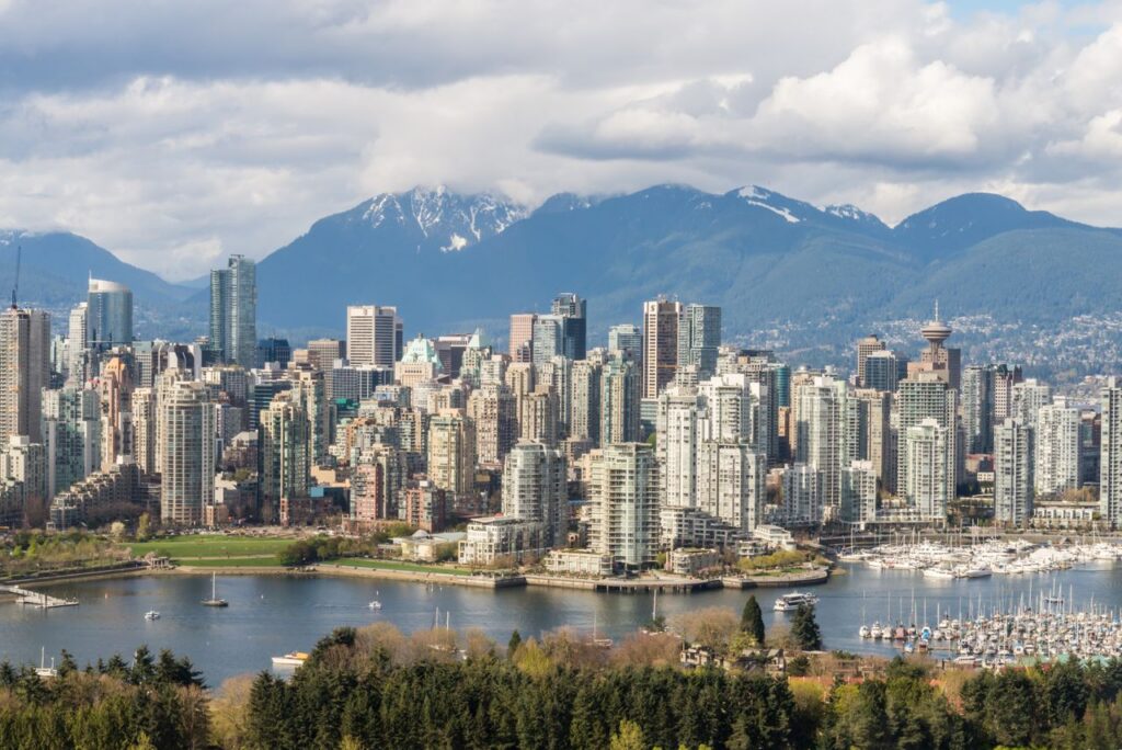 pexels photo 29072584 Stunning view of Vancouver's skyline with mountains and marina in the background.